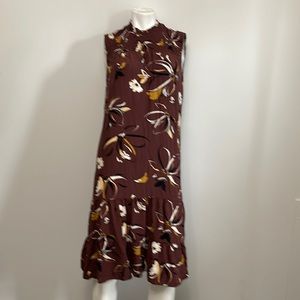 Bohemian style, buttons in the back.